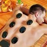 Hot stone massage by female