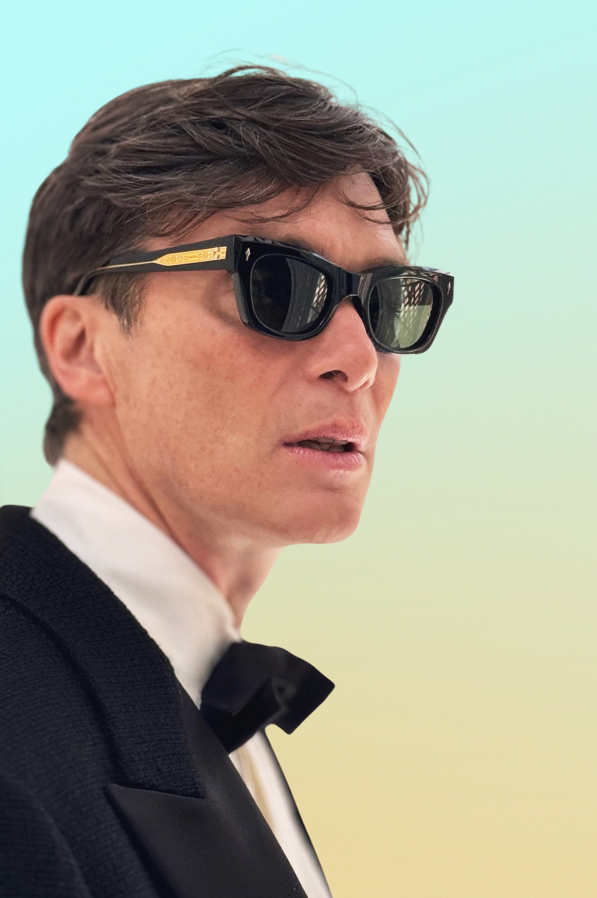 Image may contain Cillian Murphy Accessories Sunglasses Clothing Formal Wear Suit Face Head Person and Photography