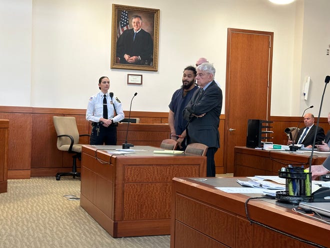 Marcel D. Santos-Padgett appears Wednesday in Worcester Central District Court along with lawyer Elliot R. Levine.