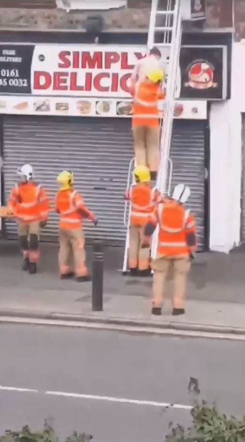  Eventually firefighters helped the stuck man down from the window ledge